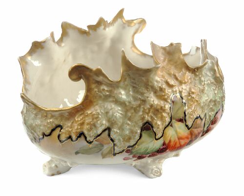 Appraisal: A Nautilus porcelain jardini re of scrolling form decorated with