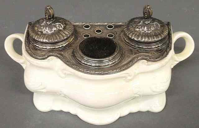 Appraisal: Cream colored ceramic inkstand c with engraved metal tops and