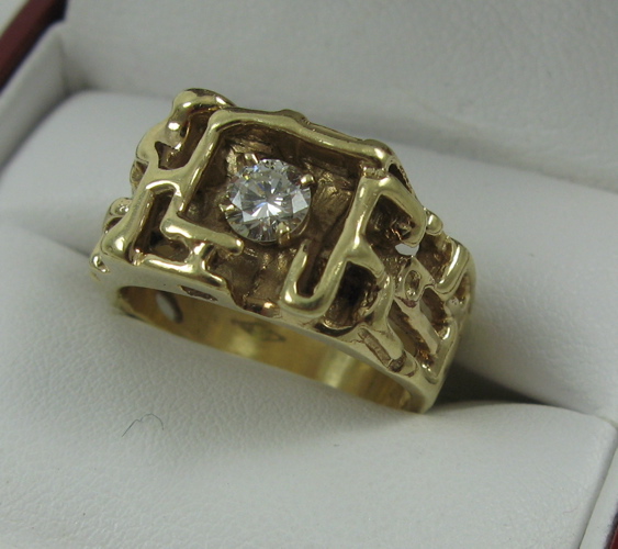 Appraisal: DIAMOND SOLITAIRE RING K yellow gold fretwork setting the estimated