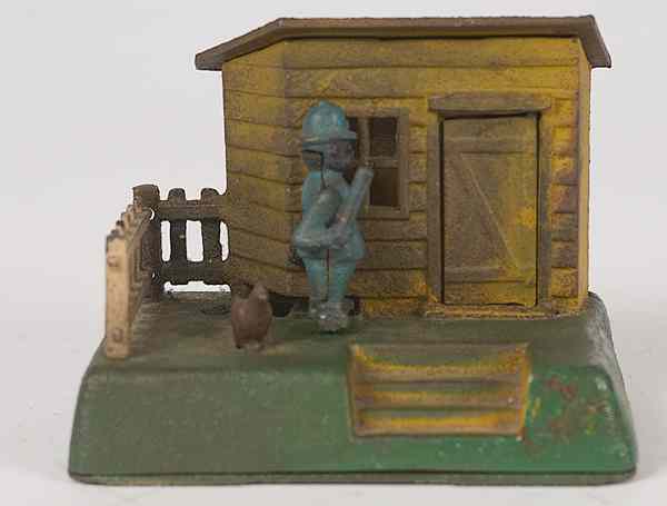 Appraisal: Uncle Remus Mechanical Bank Recast American a cast iron Uncle