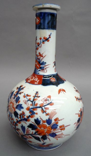 Appraisal: A th century Imari bottle vase and cover painted in