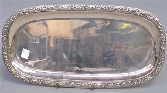 Appraisal: CONTINENTAL SILVER TRAY Of oval form rim decorated with repousse