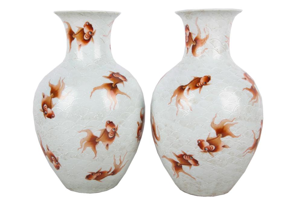 Appraisal: PAIR OF CHINESE FISH MOTIF PORCELAIN VASESCondition with discoloration to