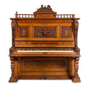 Appraisal: A German Carved Walnut Upright Player Piano and Upholstered Bench