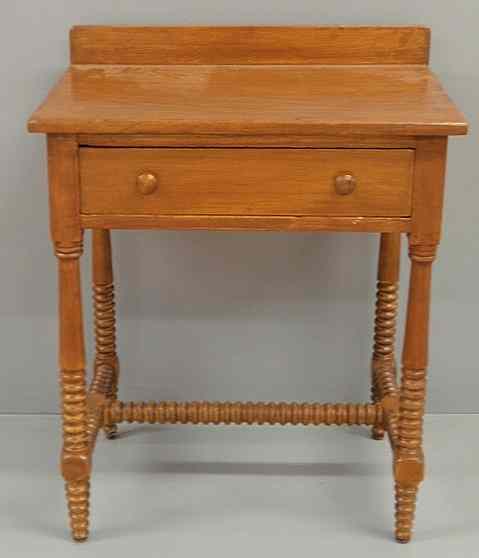 Appraisal: Pine washstand c with spool turned legs and a single