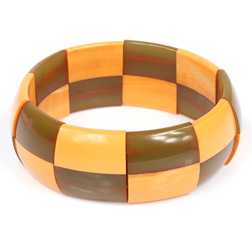 Appraisal: VINTAGE BAKELITE ART DECO STRETCH BRACELET WITH LAMINATED CUSTARD AND