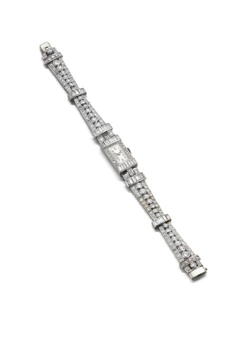 Appraisal: An Art Deco platinum and diamond cocktail watch the slim