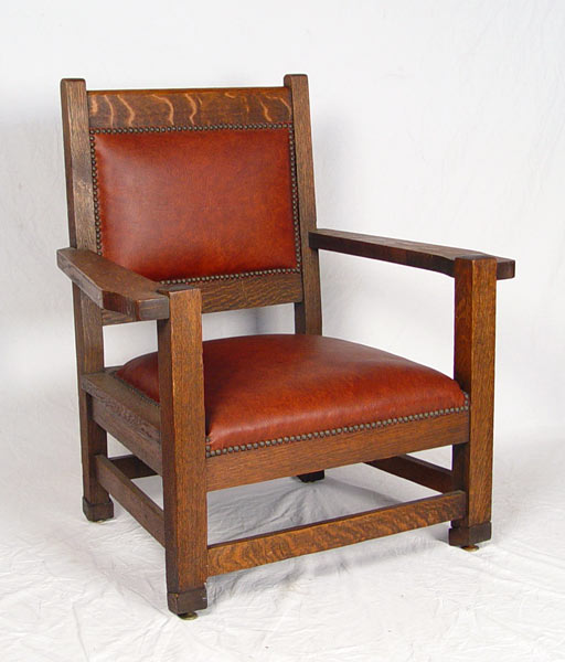 Appraisal: PERIOD ARTS CRAFTS OAK CHAIR Converted from a rocking chair