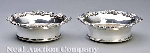 Appraisal: A Pair of Regency-Style Silverplate Wine Coasters each with molded