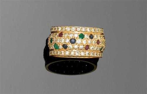 Appraisal: DIAMOND AND GEMSTONE RING Yellow gold Broad band ring entirely