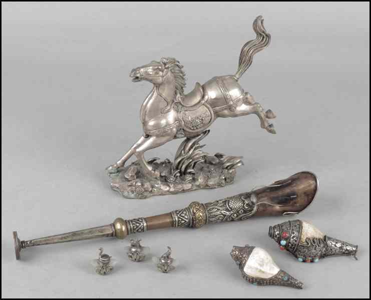 Appraisal: TIBETAN BRASS HORN Together with a Chinese silvered bronze horse