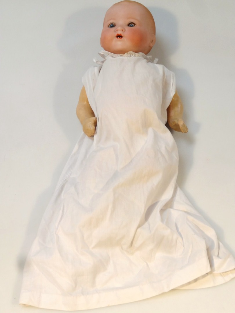 Appraisal: An early thC Armand Marseille German bisque headed baby doll