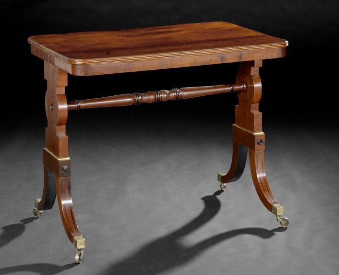 Appraisal: Regency-Style Mahogany Table late th century the rounded rectangular top