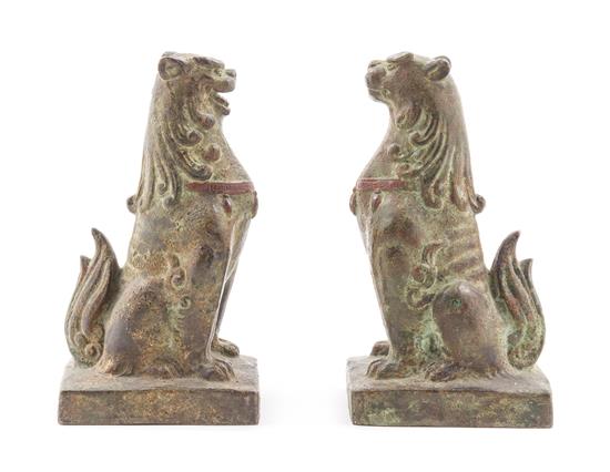 Appraisal: Sale Lot A Pair of Bronze Guardian Figures each depicted