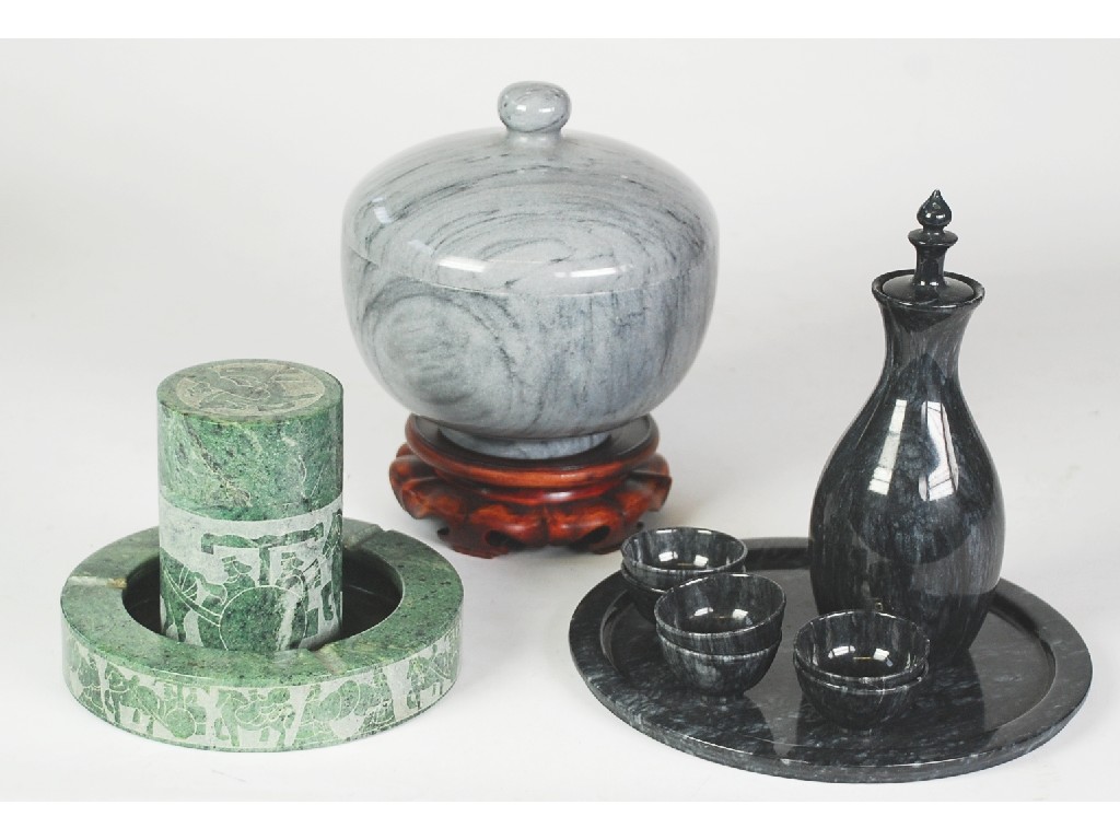 Appraisal: ORIENTAL BLACK VEINED MARBLE SEVEN PIECE SAKE SET comprising baluster