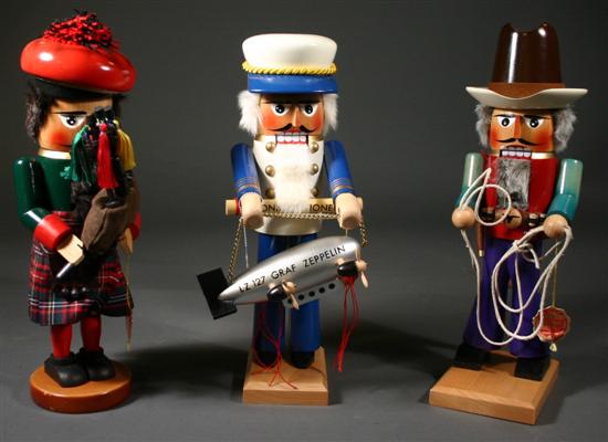 Appraisal: Three Steinbach figural nutcrackers - Bagpiper Cowboy Zeppelin pilot Germany