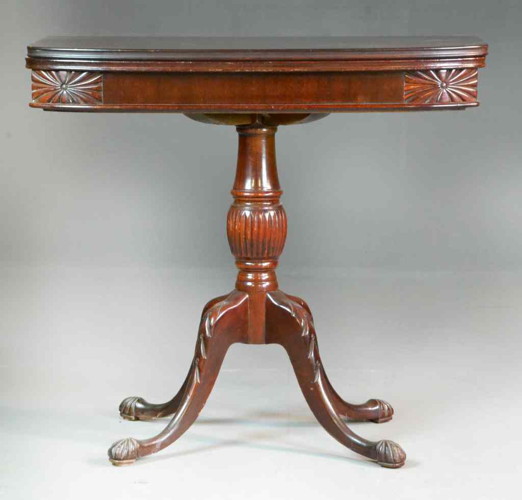 Appraisal: Mahogany Folding Game TableSquare-topped folding table raised on reeded pedestal