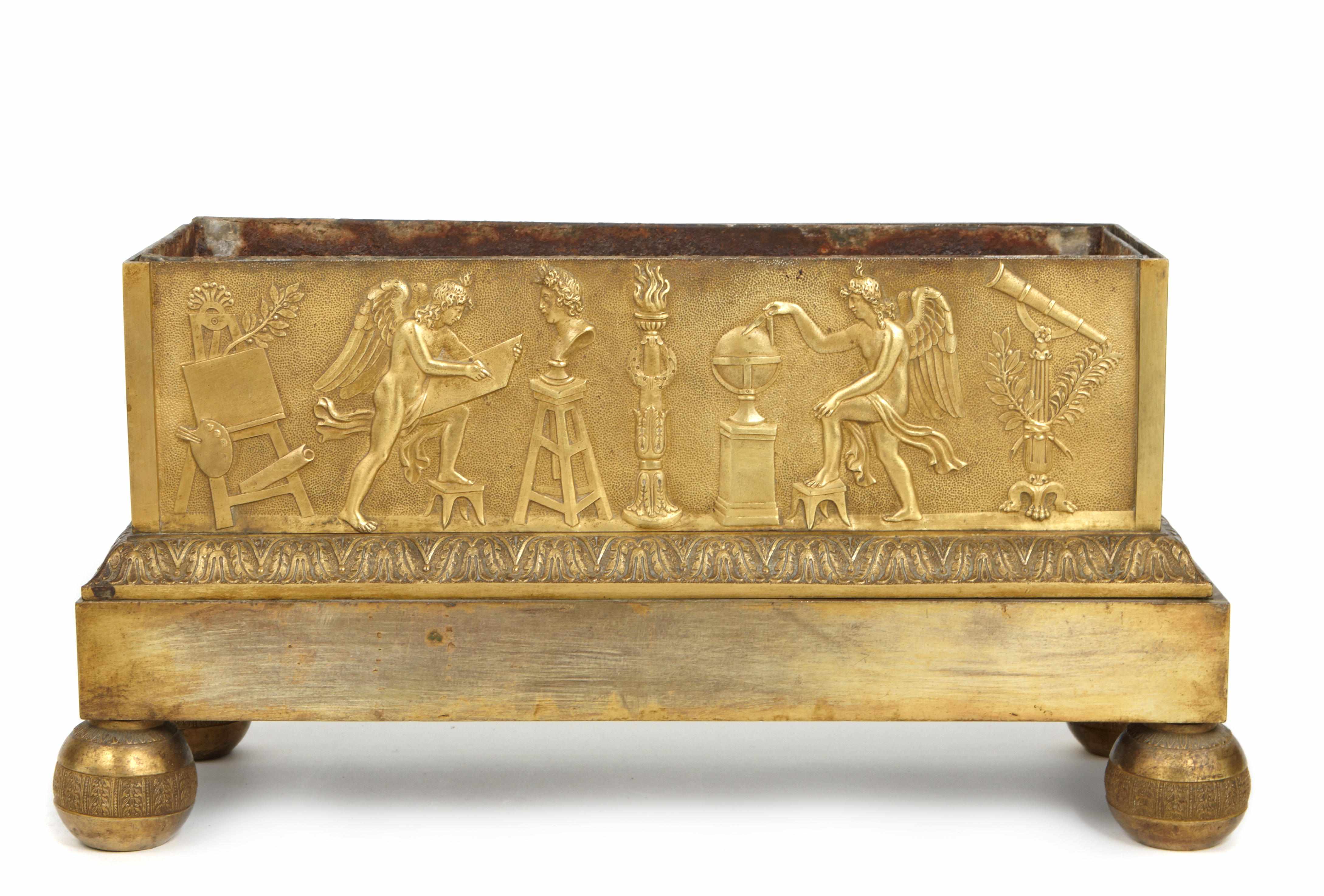 Appraisal: A French gilt bronze clock base Relief decorated with figures