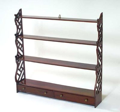 Appraisal: A set of George III mahogany hanging shelves the four