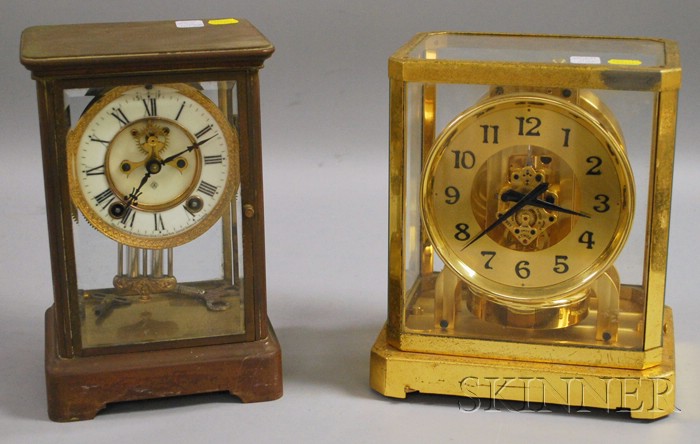 Appraisal: Two Brass Cased Clocks including an Ansonia crystal regulator with