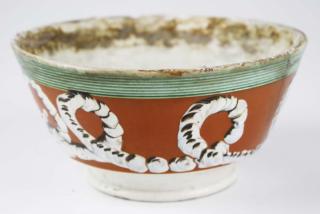 Appraisal: early th c mocha bowl with earthworm decoration dia ht