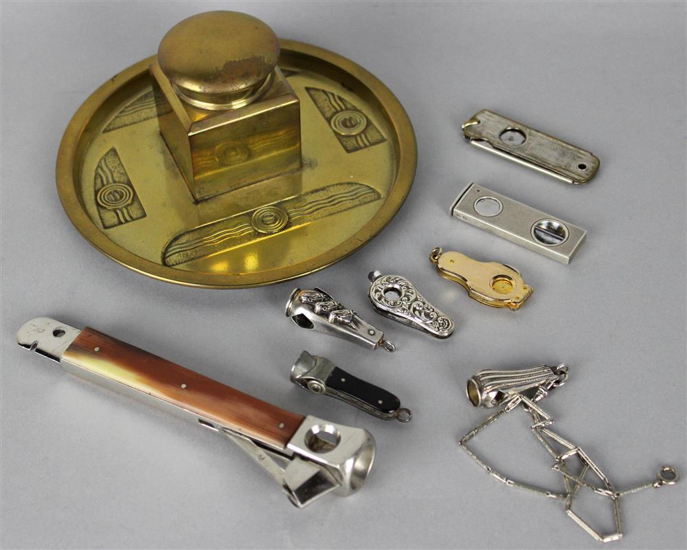 Appraisal: GROUP OF SMOKER'S ACCESSORIES including four silver cigar cutters one