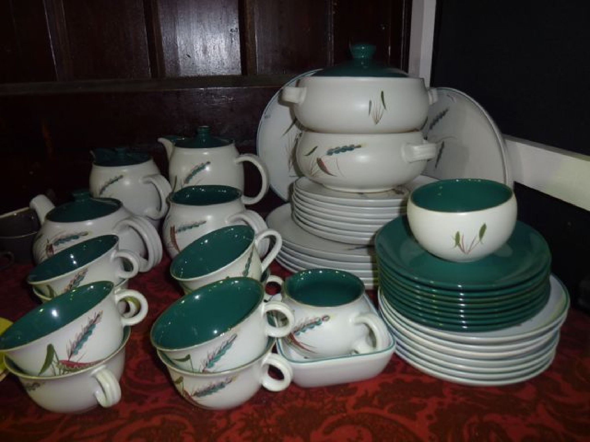 Appraisal: A quantity of Denby Green Wheat pattern dinner and tea