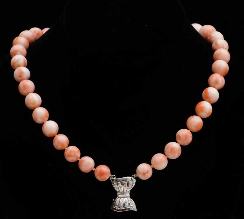 Appraisal: K WHITE GOLD CORAL AND DIAMOND DOUBLE STRAND NECKLACE in