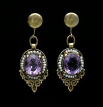 Appraisal: Amethyst Ear Pendants French screw backs on these oval cut