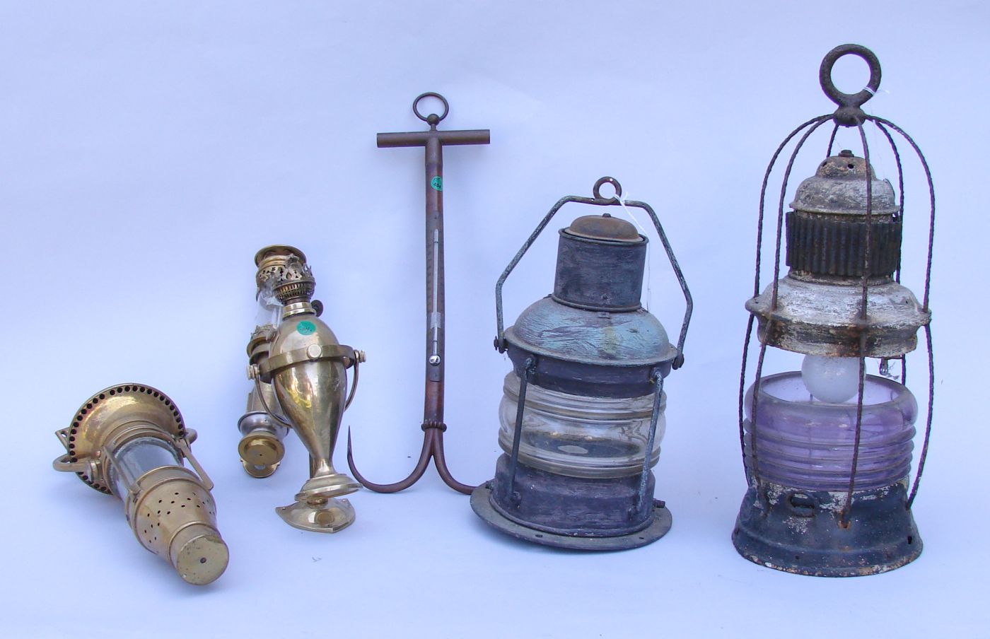 Appraisal: SIX NAUTICAL LIGHTS AND INSTRUMENTS Two brass gimballed lights two