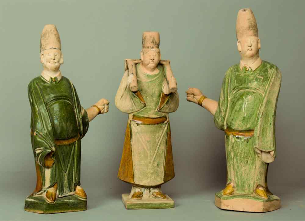 Appraisal: THREE CHINESE GLAZED POTTERY FIGURES in the Ming style with