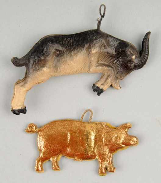 Appraisal: Lot of German Dresden Ornaments Description Includes one pig and