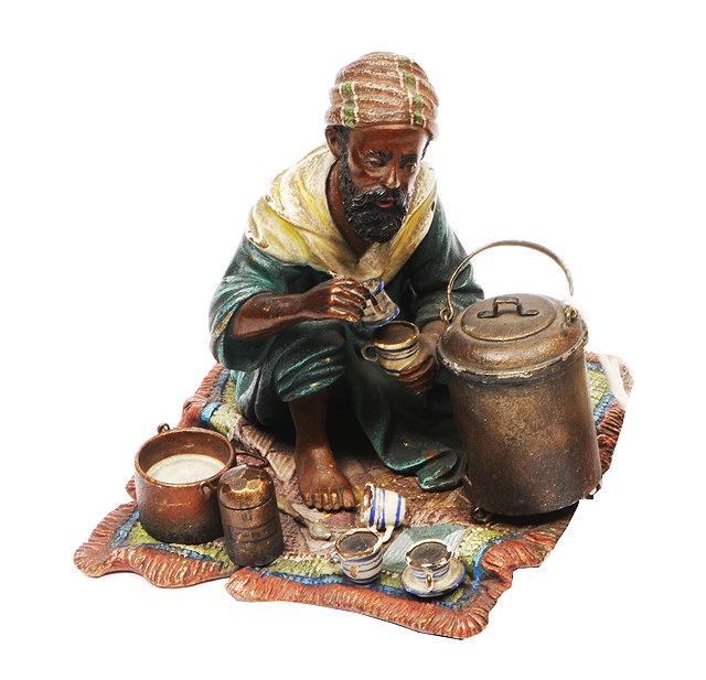 Appraisal: AN AUSTRIAN BRONZE COLD PAINTED FIGURE showing an African tea