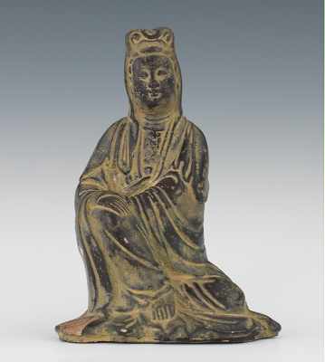 Appraisal: A Stoneware Guanyin Figurine Depicted in a seated position brownish