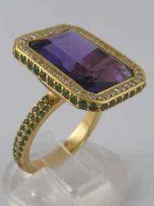 Appraisal: A yellow metal tests carat gold amethyst diamond and demantoid