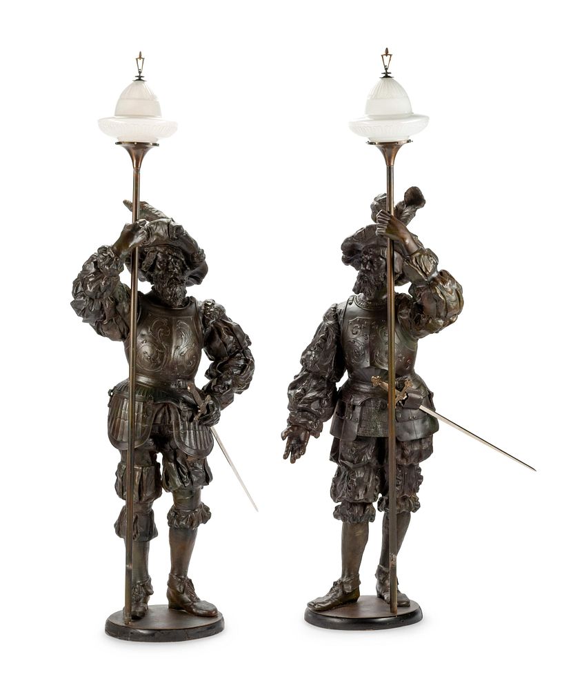 Appraisal: A Pair of Cast Metal Figural Torcheres A Pair of