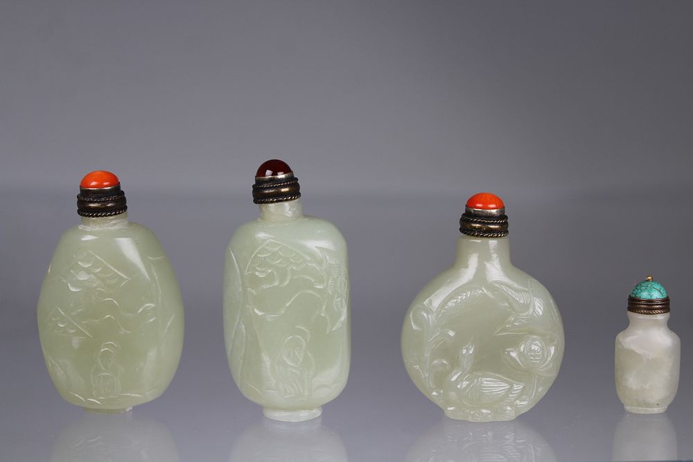 Appraisal: Chinese Carved Jade Snuff Bottles Chinese Carved Jade Snuff Bottles