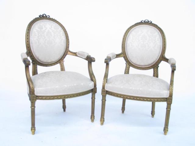 Appraisal: A pair of Louis XV style arm chairs with gilded