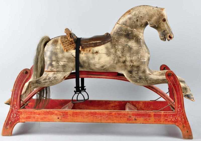 Appraisal: Early Wooden Rocking Horse Toy Description American Stenciled base Leather