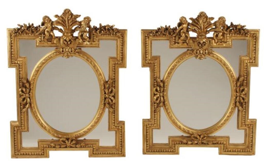 Appraisal: pair Louis XVI style gilt cast resin mirrors with putti