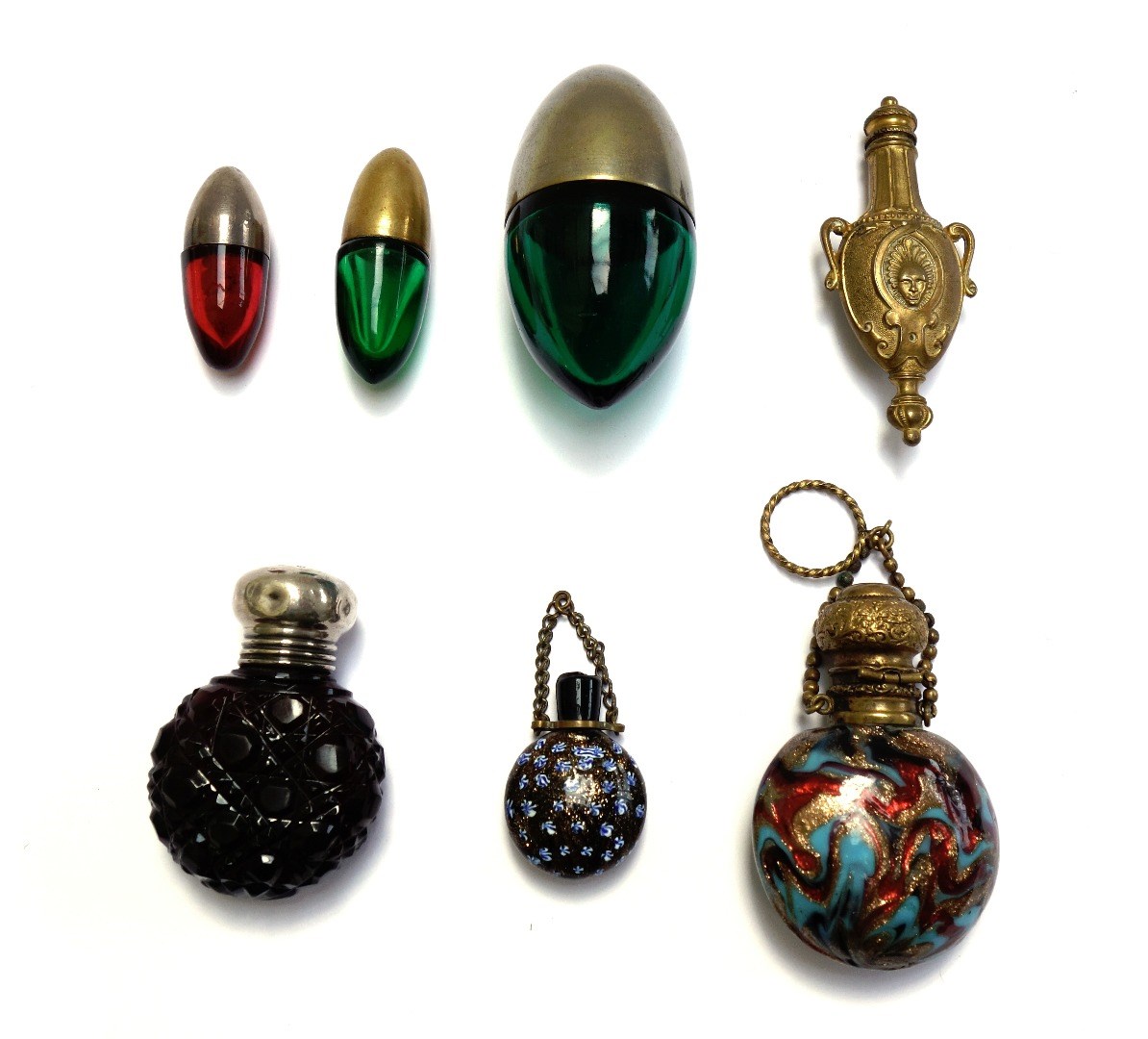 Appraisal: Three coloured glass and metal mounted scent bottles early th