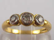 Appraisal: An carat gold three stone round brilliant cut diamond ring