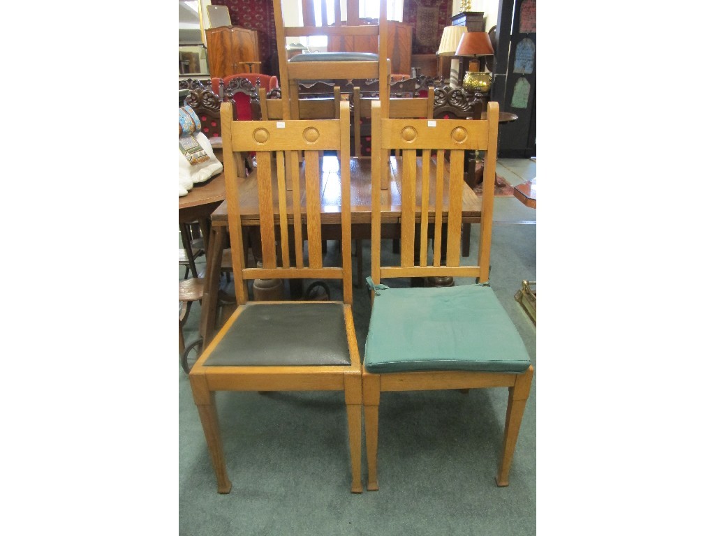 Appraisal: Oak pull out dining table with five bar back dining