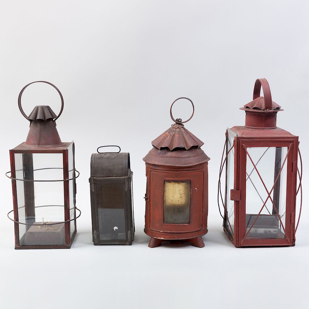 Appraisal: Group of Four Tin and Glass Candle Lanterns Each of