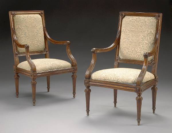 Appraisal: A pair of Louis XVI carved walnut fauteuils fourth quarter