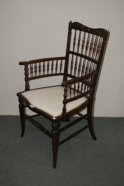 Appraisal: Edwardian mahogany inlaid elbow chairwith brass and mother of pearl