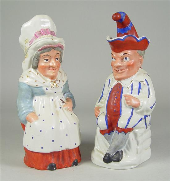 Appraisal: Pair of English Tobys Punch and Judy with heavy coloration