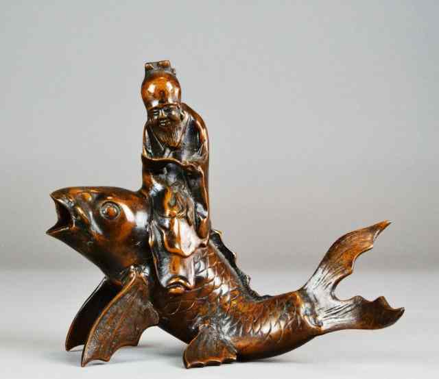 Appraisal: Japanese or Chinese Bronze of Fish ScholarNicely sculpted bronze depicting