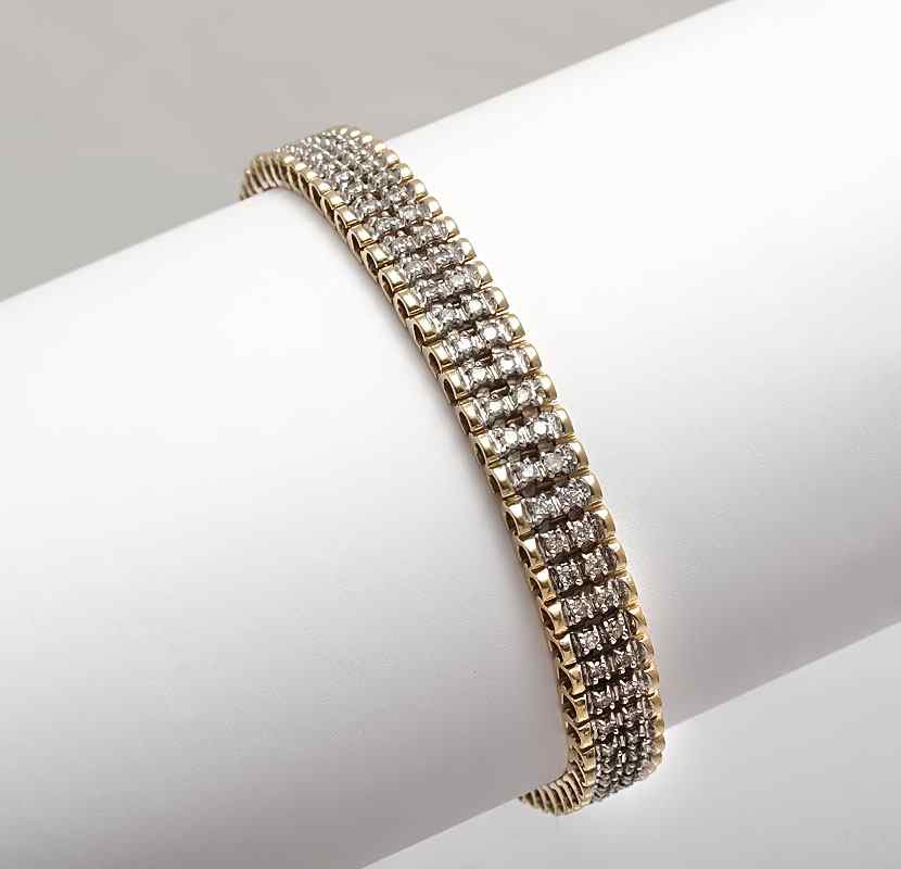 Appraisal: CTW DIAMOND BRACELET K yellow gold bracelet contains round full