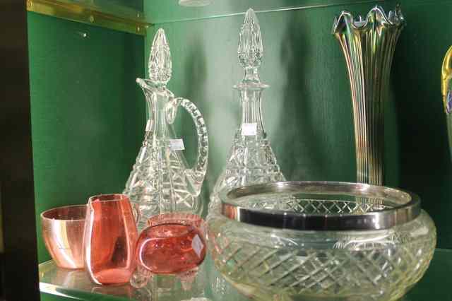 Appraisal: A SILVER AND CUT GLASS PUNCH BOWL two decanters four